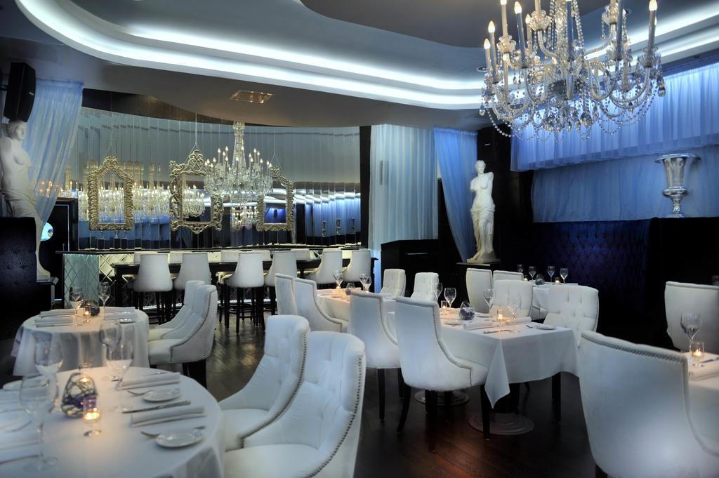 Sun City Hotel - The Gabriel Kairo Eksteriør bilde Restaurant in the hotel